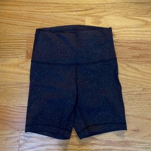 Never worn Lululemon biker shorts